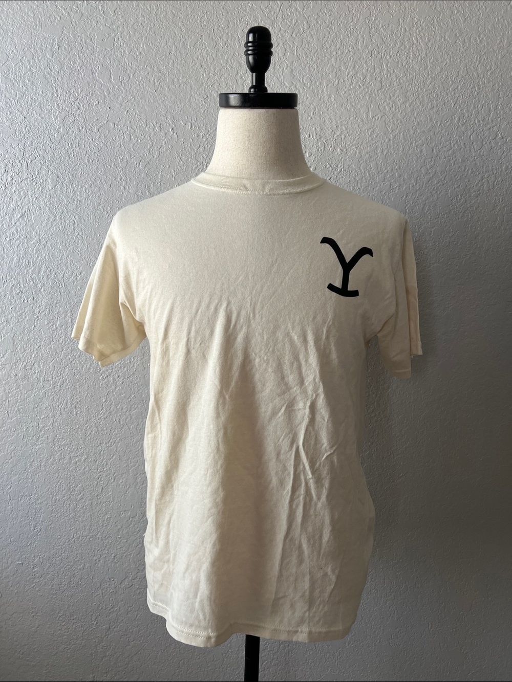 Cream Short-Sleeve Tee with Subtle Black Chest Mark